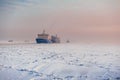 Big cargo ship in frozen ice sea fairway Royalty Free Stock Photo