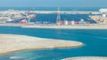 Big cargo ship at industrial port aerial fiew from above at evening in Abu Dhabi Royalty Free Stock Photo