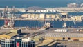 Big cargo ship at industrial port timelapse aerial fiew from above at evening in Abu Dhabi Royalty Free Stock Photo