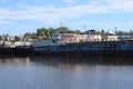 Big cargo ships are in bay on river at summer sunny day Royalty Free Stock Photo