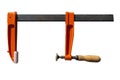 Big carpentry clamp with a wooden grip, on a white background with a clipping path.