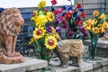 Big Cat Lion and Elephant Sculptures in Garden with Sunflowers