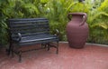 Big ceramic vase and banch on the terrace