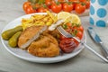 Big Chicken schnitzel with homemade chilli french fries