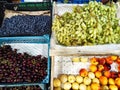 big choice of fresh fruits and vegetables on market counter Royalty Free Stock Photo