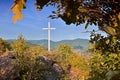 Big Christian cross on the way to Mlynaruv kamen lookout to valley of european river Labe in Czech central mountains tourist area Royalty Free Stock Photo