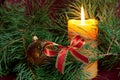 Big Christmas baubles and candles on dark Royalty Free Stock Photo