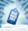 Big Christmas sale on winter background with branches of tree Royalty Free Stock Photo