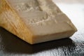 Big chunk of italian parmesan cheese on slate board Royalty Free Stock Photo