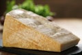 Big chunk of italian parmesan cheese on slate board Royalty Free Stock Photo