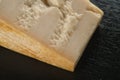 Big chunk of italian parmesan cheese on slate board Royalty Free Stock Photo