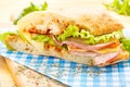 Big Ciabatta Sandwich with Bacon, Lettuce, Tomato, Cheese Royalty Free Stock Photo