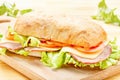 Big Ciabatta Sandwich with Bacon, Lettuce, Tomato, Cheese Royalty Free Stock Photo