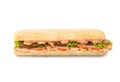 Big Ciabatta Sandwich with meat, tomatoes, cucumbers and sauces on a white background. Royalty Free Stock Photo