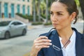 Big city, big business dreams. a thoughtful young businesswoman in the city. Royalty Free Stock Photo