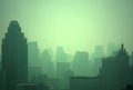 Big city at misty sunrise Royalty Free Stock Photo