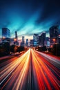 big city skyline and traffic lights blurred motion, skyscrapers and highway light trails at rush hour Royalty Free Stock Photo