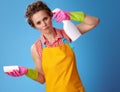 Woman with kitchen sponge wanting to shoot herself from bottle