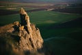 Big cliff on a green plain