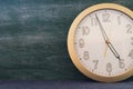 Big clock with chalkboard background Royalty Free Stock Photo