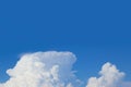 Big cloud belows the clear blue sky Royalty Free Stock Photo