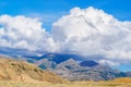 Big cloud lying on a hilltop Royalty Free Stock Photo