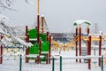 outdoor playground equipment in winter Royalty Free Stock Photo