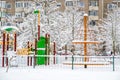 outdoor playground equipment in winter Royalty Free Stock Photo
