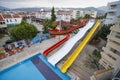 Big colorful water slide fun park with swimming pool - concept acitivities sports leisure holiday vacation travel fun water