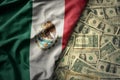 colorful waving national flag of mexico on a american dollar money background. finance concept Royalty Free Stock Photo