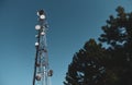 A big communication tower with a lot of GSM and internet antennas Royalty Free Stock Photo