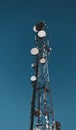 A big communication tower with a lot of GSM and internet antennas Royalty Free Stock Photo