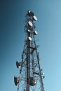 A big communication tower with a lot of GSM and internet antennas Royalty Free Stock Photo