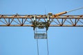 Big construction crane part on blue sky background Royalty Free Stock Photo