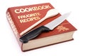 Big cookbook with wooden spoon and kitchen knife