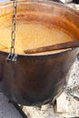 Big copper caldron on open fireplace, selective focus