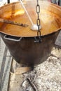 Big copper caldron on open fireplace, selective focus