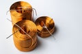 Big copper coils on white background