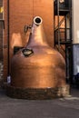 Big copper pot in front of the Old Jameson Distillery, Dublin, I Royalty Free Stock Photo