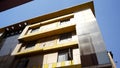 Corner side view shot of dwelling house, balconies with glass window in pink city jaipur Royalty Free Stock Photo