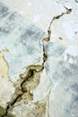 Big crack on blue wall of old building, abstract image of diagonal crack, detail. Consequences of earthquake. Copy space. Royalty Free Stock Photo