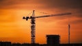 Big crane and building construction against beautiful dusky sky Royalty Free Stock Photo