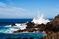 Big crashing wave splashing over the rocks Royalty Free Stock Photo