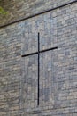 Big cross carved into the wall of cobblestone Royalty Free Stock Photo