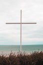 Big cross with sea on the background Royalty Free Stock Photo