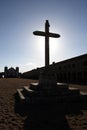 Big cross silhouette and church on second plan