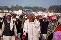 Big crowd of Indian adults rushing