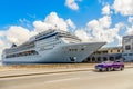 Big cruise ship docked in port of Havana and road with retro old Royalty Free Stock Photo