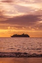 Cruise ship on the horizon with sunset sky Royalty Free Stock Photo