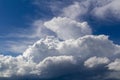 Big cummulus white cloud on blue sky